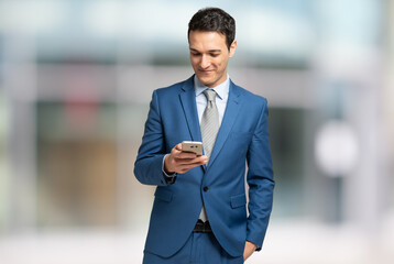 Businessman using his mobile phone