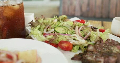 Poster - Fresh salad and grilled beef in outdoor cafe