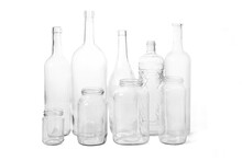 Group Of A Glass Bottles And Jars On White Background