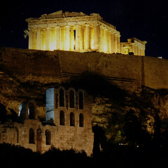 Wall Mural - Athens Acropolis with Parthenon temple and arches of the roman Hadrian's conservatory night view. A rare photo of the temple without scaffolds.