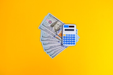 Sticker - Money and banking concept, banknote with calculator on desk background