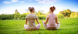 © candy1812 - Two women sitting in active wear in lotus position in nature.