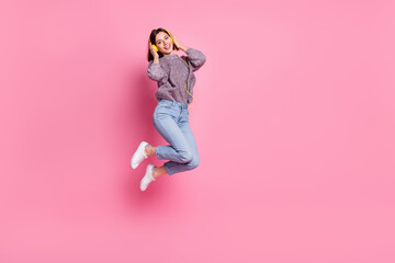 Wall Mural - full length body size view of attractive cheerful girl jumping listening single isolated over pink p