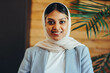© Jacob Lund - Portrait of a Muslim businesswoman wearing a hijab in an office
