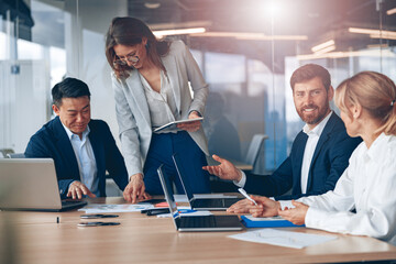 Wall Mural - A group of business people partners during a set team meeting in the modern office. Teamwork concept