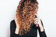 © progressman - Young woman with thick curly hair
