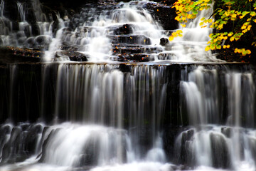 Sticker - Beautiful view of Wagner Falls during daytime in the autumn season, Michigan, United States