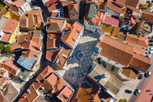 Aerial View Of An Old Little Square In Seixal Old Town With A City Church, Seixal, Portugal.