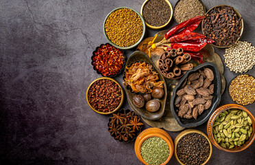 Sticker - Top view of various Indian spices and seasonings on a table