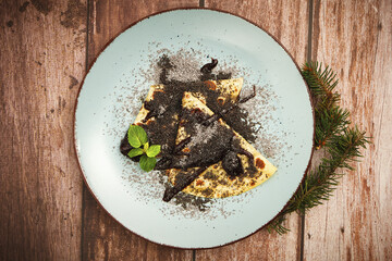 Sticker - Top view shot of a white ceramic plate with tortilla bread and black spice