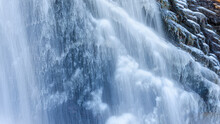 Closeup Shot Of Frozen Waterfall With Beautiful Patterns
