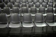 Gray Empty Audience Seats Arranged In Rows