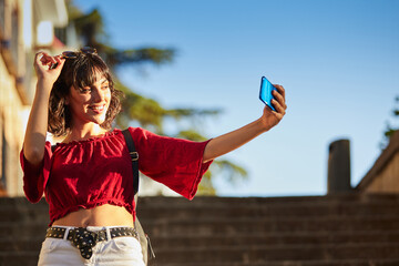 Poster - Teenager girl taking a selfie.