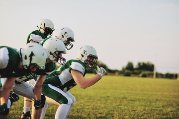 Wall Mural - American football team practicing formations during practice