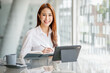 © David - Happy attractive Asian business woman working with a laptop and financial document at office, successful action, Business concept.