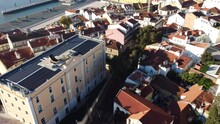Drone Flight Over The Red Roofs Of Houses In Lisbon.