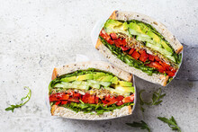 Vegetable Sandwich In Paper Wrap. Vegan Healthy Food, Takeaway Food.