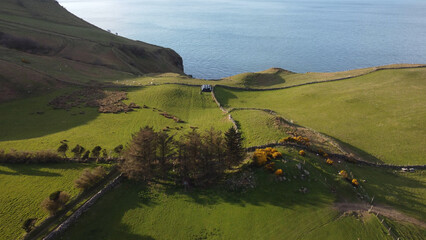 Wall Mural - The beautiful landscape of Antrim Northern Ireland - aerial view by drone from above