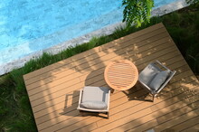 Chair And Deck On Veranda, Pool View
