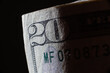 corner of banknote of stack of twenty dollars, close up, front side
