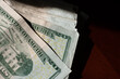 stack of twenty american dollars banknotes on table, close up, reverse side