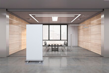 Modern Glass Partition Meeting Room Interior With Empty White Mock Up Roll Up Poster, Furniture And Equipment. 3D Rendering.