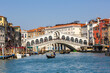 Venice Rialto bridge over Canal Grande with gondola travel traveling holidays vacation town in Italy