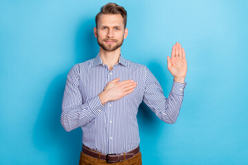 Sticker - Photo of focused serious person arm palm heart promise swear look camera isolated on blue color background