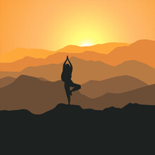 Silhouette Of A Person Standing On A Mountain