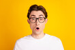 Photo of young man amazed shock omg wow impressed astonished fake information isolated over yellow color background