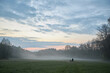 © 4Max - Family with children walking in a foggy meadow