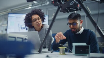 Poster - Successful Startup: Black Male Engineer Tell his Ideas to Female Developer while Work at Drone Design. People Designing Unmanned Aerial Vehicle Concept. Slow Motion