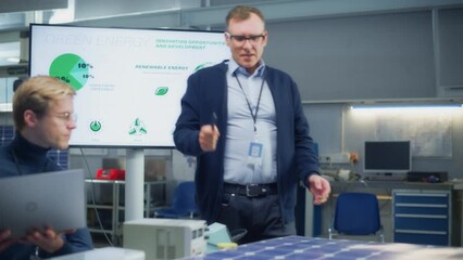 Poster - Chief Engineer Point at Projection Screen and Talks About Green Energy and Solar Panels Future Possibilities. Engineering and Sustainable Energy Education Concept. Portrait View