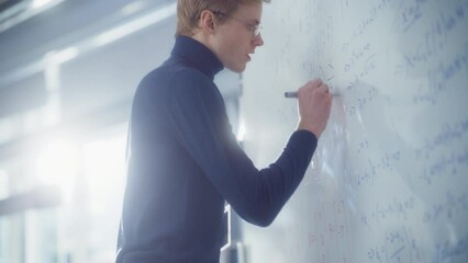 Poster - Young Mathematician Approaches Whiteboard and Thinks about Solving Long and Complex Equation/ Formula. Genius Developing New Theories Concept. Portrait View