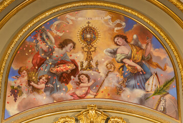 Fototapete - VALENCIA, SPAIN - FEBRUAR 17, 2022: The fresco of Glory of Eucharist in the church Iglesia de San Valero y San Vicente Martir by unknown artis of 20. cent.