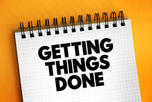 Getting Things Done - personal productivity system, to deal with situations quickly and efficiently, text on notepad concept background