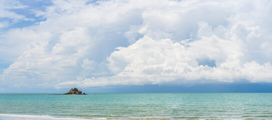 Wall Mural - tropical beach and sea in sunny day with small island