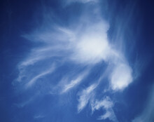 Wispy Cloud In A Blue Sky