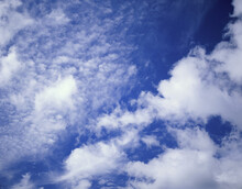 Cumulus Clouds In A Blue Sky