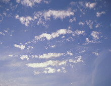 Scattered White Clouds In The Sky