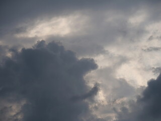 Wall Mural - rising thunderstorm with dark clouds in the sky