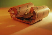 Coins Wrapped In A Paper Roll