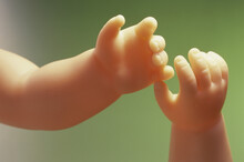 Close-up Of The Hands Of A Doll