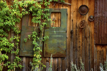 Metal Artifacts Hanging On A Wooden Wall, Silver City, Idaho, USA