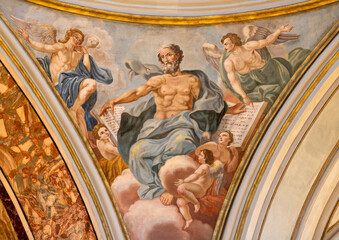  MONOPOLI, ITALY - MARCH 5, 2022: The fresco of St. Matthew the Evangelist in cupola of Cathedral - Basilica di Maria Santissima della Madia from 18 cent.