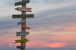 © SuperStock - Road signs on a wooden post, Fort Bulnes, Magellanes, Chile