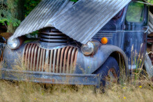 Old Chevrolet Truck In Field