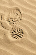 © SuperStock - Close-up of boot print on sand, Pacific Beach, Washington State, USA
