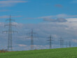 © focus finder - Hochspannungsmasten einer Überlandleitung