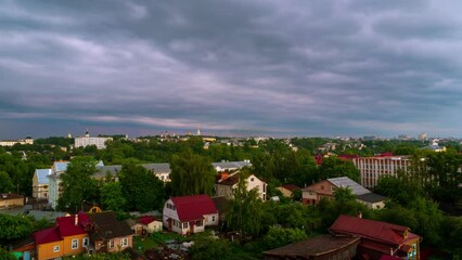 Wall Mural - Vladimir, Russia. View of Vladimir, Russia in the evening. Aerial view of the various buildings with fast moving sunset clouds. Golden Ring tour in summer. Time-lapse